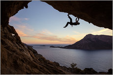 Galleriataulu  Climber in a cave at sunset