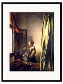 Kehystetty taidepainatus  Girl reading a letter at an open window - Jan Vermeer
